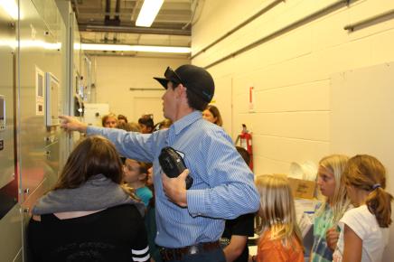 Students learn how the pumps inside a recycled water plant work.